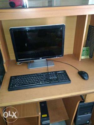 Black Desktop Computer along with table