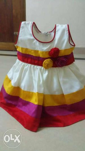 Girl's White, Red, And Yellow Dress contact on renees