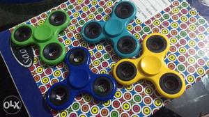 Green, Blue, And Yellow 3-bladed Fidget Spinners