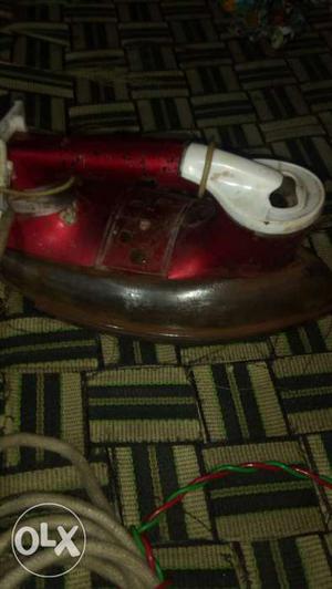 Red And White Clothes Iron