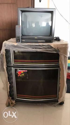  channel, color tv with tv trolly, in