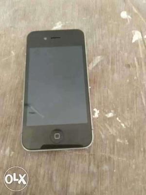 Iphone 4s in black colour with charger