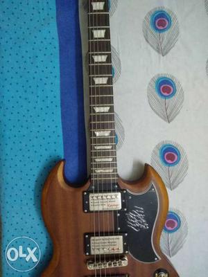 1 Month Old Epiphone Electric Guitar with bill