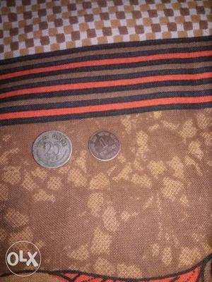 1 paise coin and 25 paise coin
