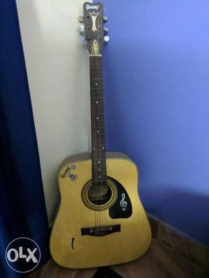 Beige Gibson Acoustic Guitar