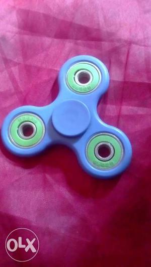 Blue green fidget spinner
