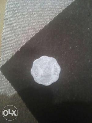Scalloped Silver-colored Coin