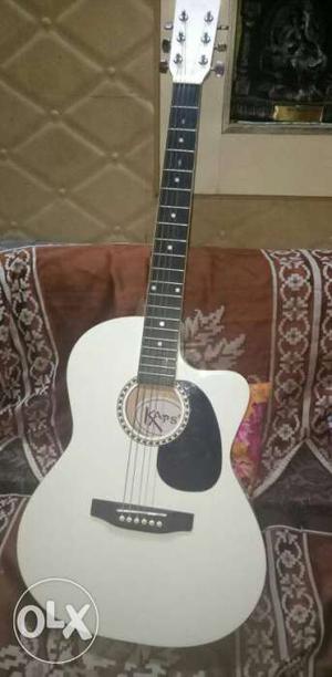 White Cutaway Acoustic Guitar