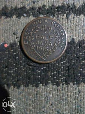 Round Indian Half-anna Coin
