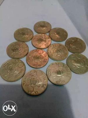 Twelve Round Silver 20 Paise Coins
