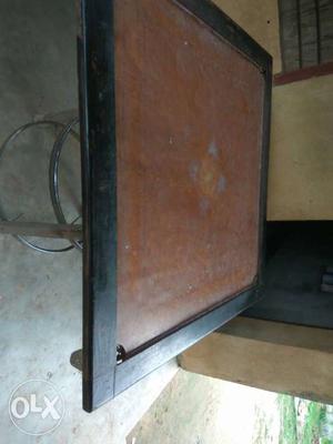 Black And Brown Wooden Karom Table