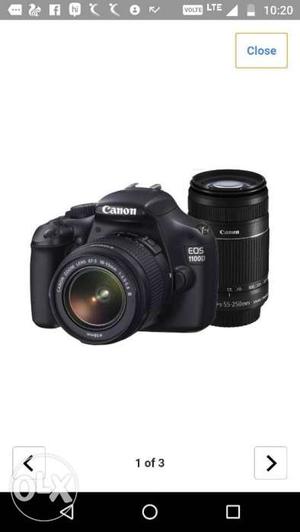 Black Canon EOS E DSLR Camera With Lens Screenshot