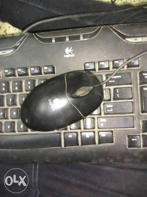 Black Logitech Computer Keyboard And Mouse