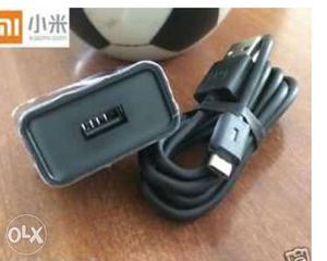 Black Travel Adapter With Cable