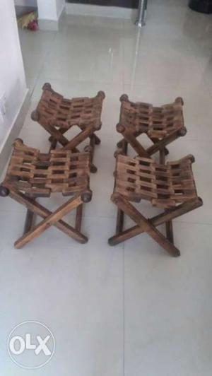 Four Brown Wooden Folding Stools. Bought from Dilli Haat