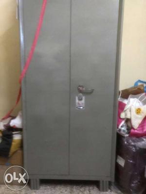 Gray iron cupboard with one locker and four compartments