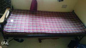 One foldable single size bed with mattress.