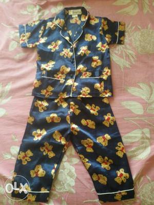 Silk blue coloured night dress with print of teddybear