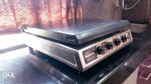 Sunflame gas stove with 4 burners and top cover