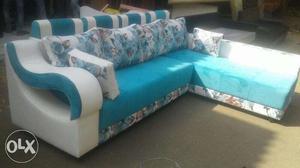 White And Teal Cushion Chaise Couch