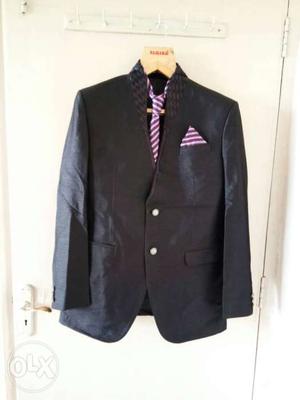 Black self shine suit. with shirt n tie..