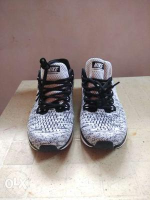 Brand new Pair Of Black-and-white Nike Athletic Shoes..size