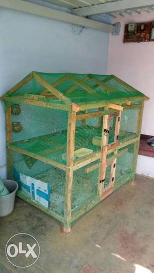 Green And Brown Chicken Cage