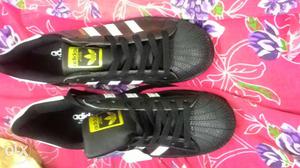 Pair Of Black-and-white Adidas Superstar new, not used size