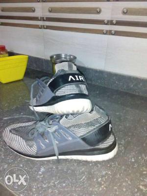 Pair Of Gray shoes size 9