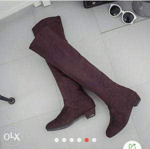 Pair Of Maroon Knee High Boots