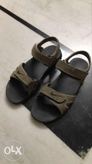Pair Of Olive-green Nike Sandals