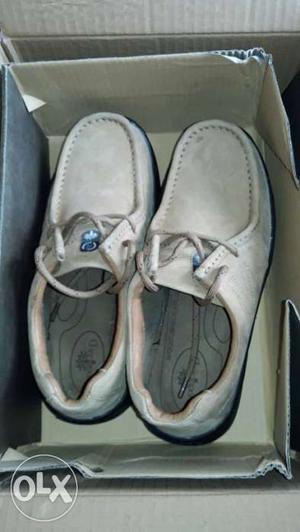 Pair Of White Suede Boat Shoes