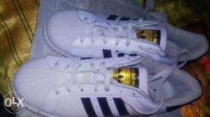 Pair Of White-and-black Adidas Superstar Low-top Sneakers