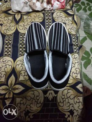 Pair Of White-and-black Pinstripe Loafers