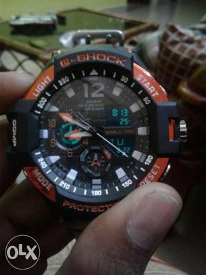 Round Black And Red G-Shock Chronograph Watch