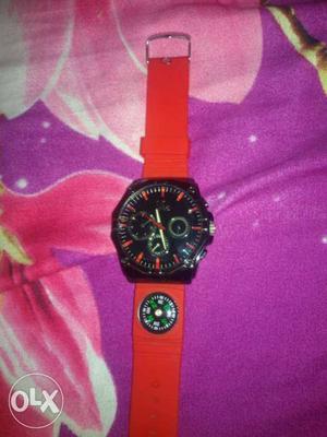 Round Black Chronograph Watch With Red Strap