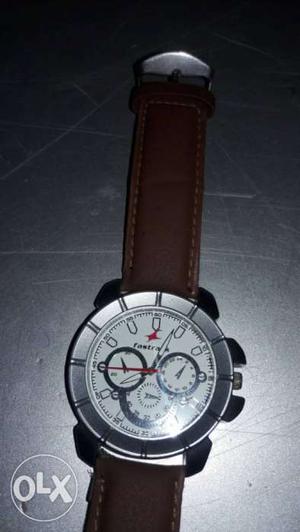 Round Gray Chronograph Watch With Brown Leather Strap