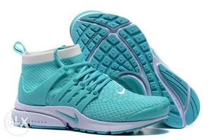 Teal-and-white Nike Basketball Shoes