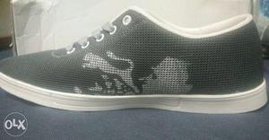 White And Black Puma Mid-top Sneakers