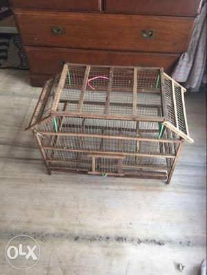 Wooden cage for birds