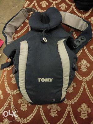 Baby's Black And White Tomy Front Carrier