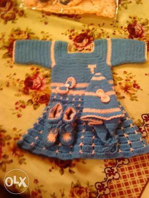Baby's Blue And White Knitted Layette