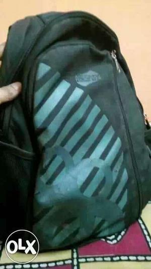 Black And Gray Striped Backpack