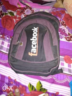 Black And Purple Facebook Print Backpack