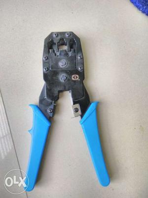 Blue Plastic Handle Black Pliers