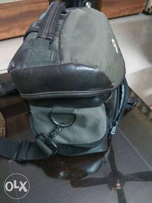 Camera bag With extra pockets for lens, charger,