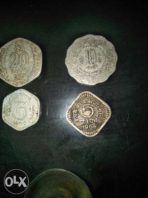 Four Silver-colored Several Coins