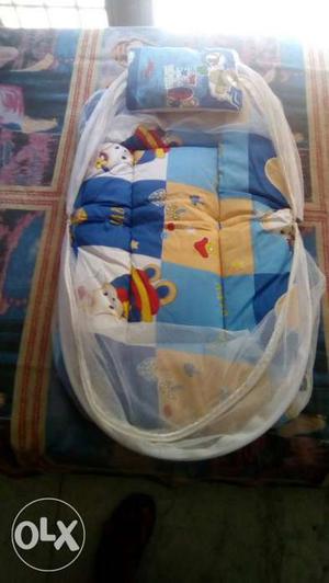 New baby's sleeping set with pillow with attached