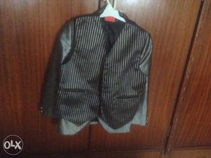 This is 3 piece suit with jacket, coat and pant