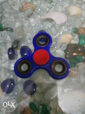 A blue colour spinner in good condition